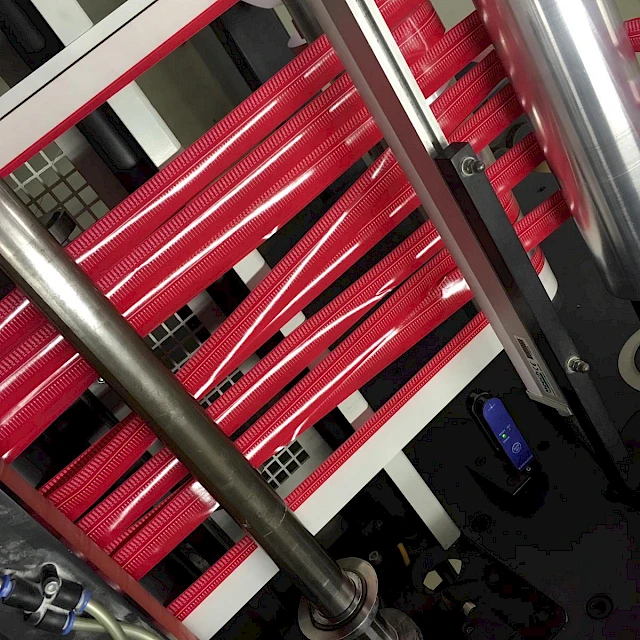 Red printed strips rewinding