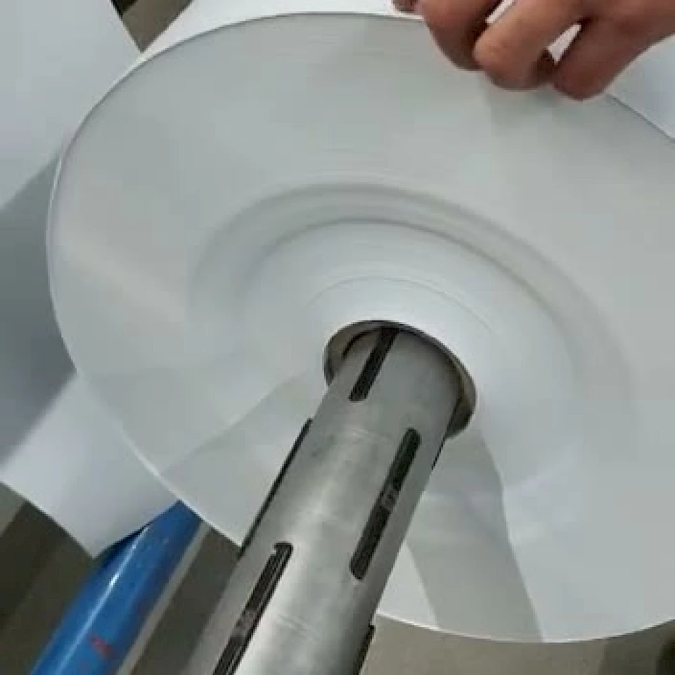 Roll thickness measurement with caliper