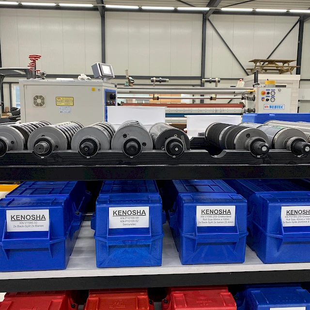 Rotary anvils on rack over kenosha bins