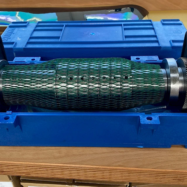 Rotary cutting die in blue storage case