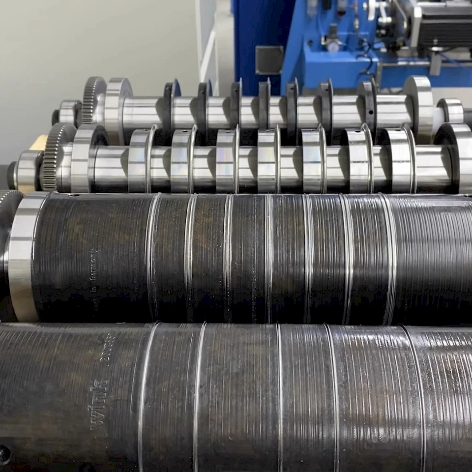 Rotary die cylinders on racks closeup