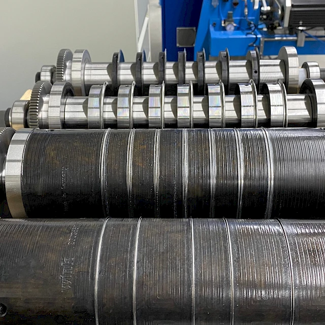 Rotary die cylinders on racks closeup