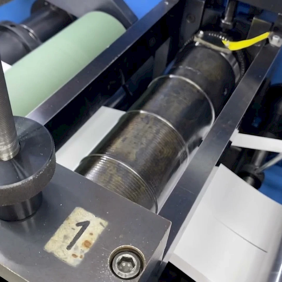 Rotary die station pressure screw close up