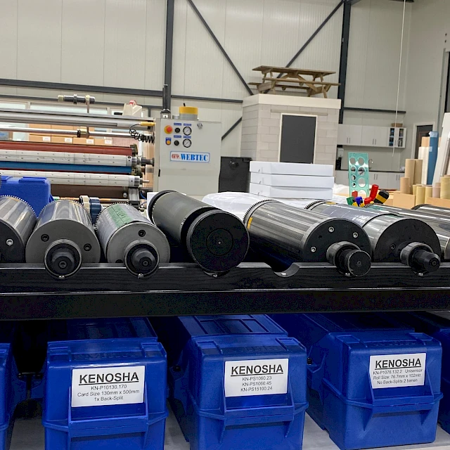 Rotary dies on rack over kenosha bins