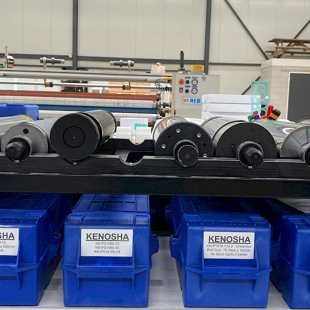 Rotary dies on rack over kenosha bins