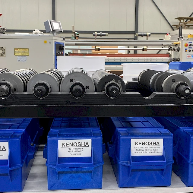 Rotary dies on rack over kenosha bins