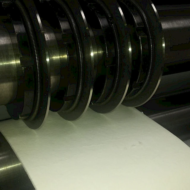 Rotary knives cutting white web