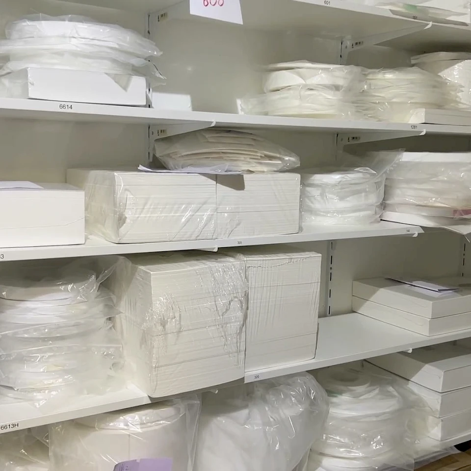 Shelves of bagged material rolls and sheets