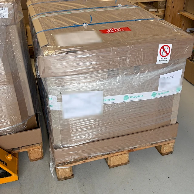 Shrink wrapped kenosha pallet in warehouse