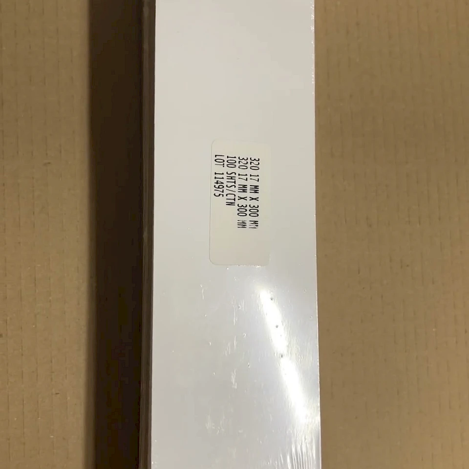 Shrink wrapped white card stack in box