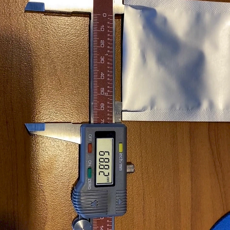 Silver foil pouch measured with caliper