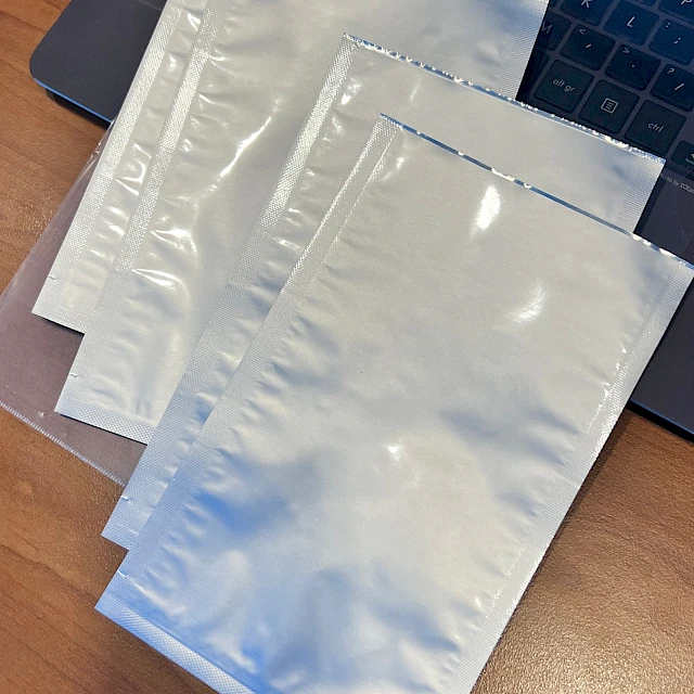 Silver foil pouches on laptop keyboard