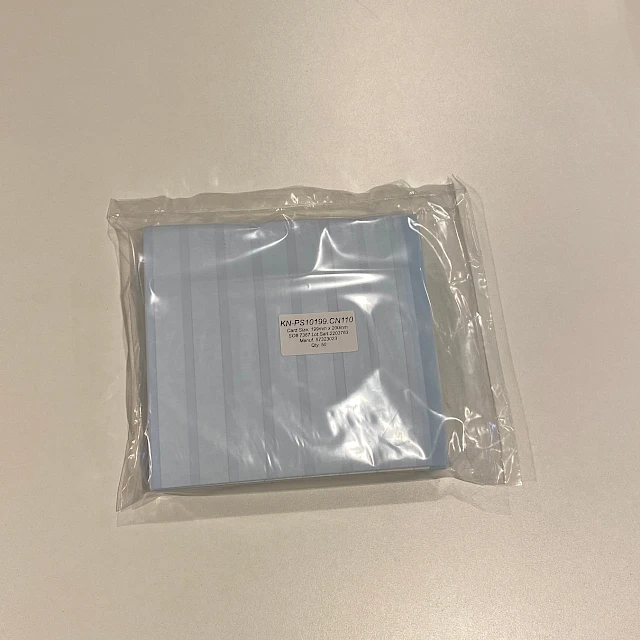 Small bag of blue backing cards on white