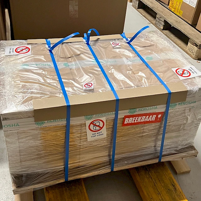 Small strapped fragile shipment on pallet