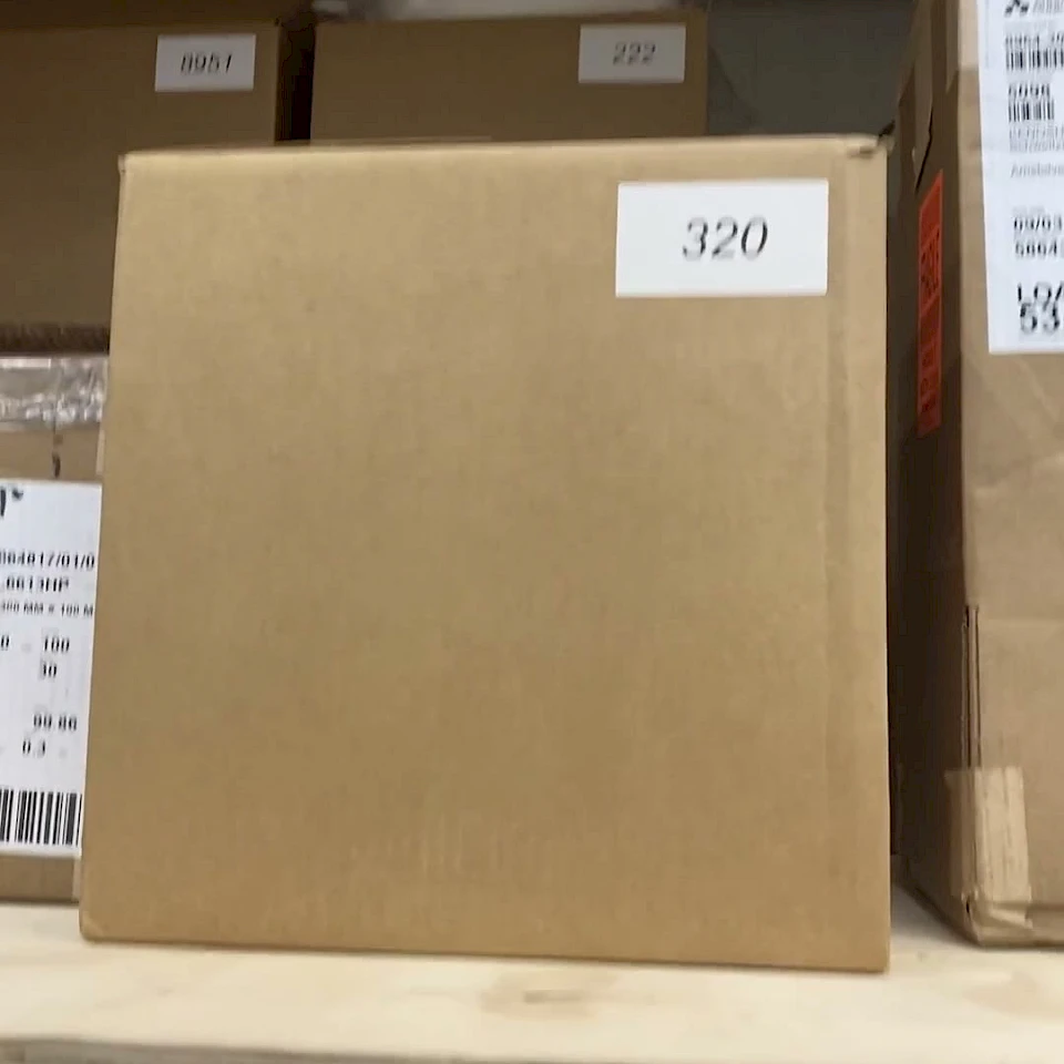 Stock cartons with grade numbers on rack