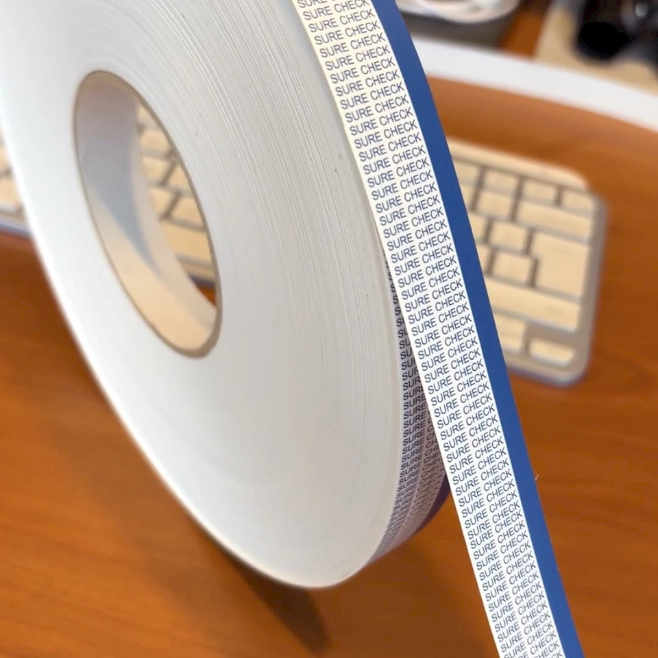 Sure check tape roll on desk