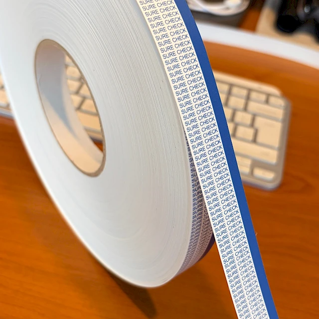 Sure check tape roll on desk
