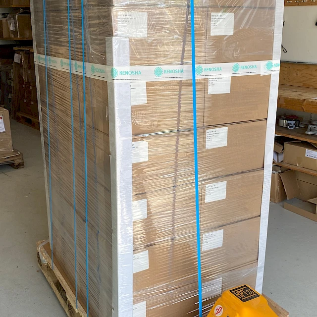 Tall kenosha taped pallet on pallet truck