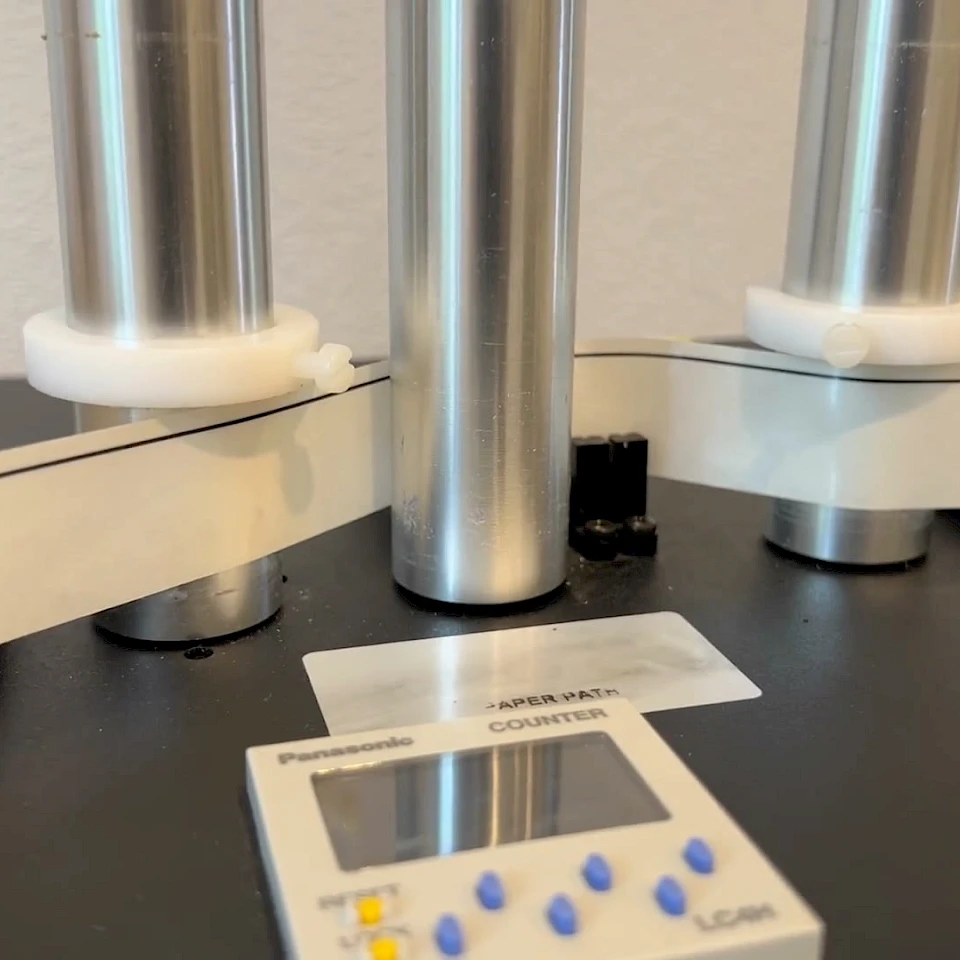 Tape counter and reel spindles on dispenser