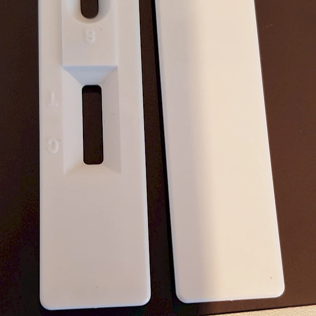 Test cassette top and bottom on keyboard