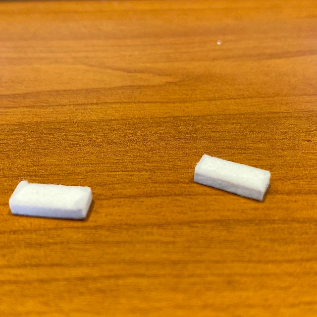 Two die cut absorbent pads