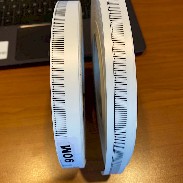 Two scale printed tape rolls 90m