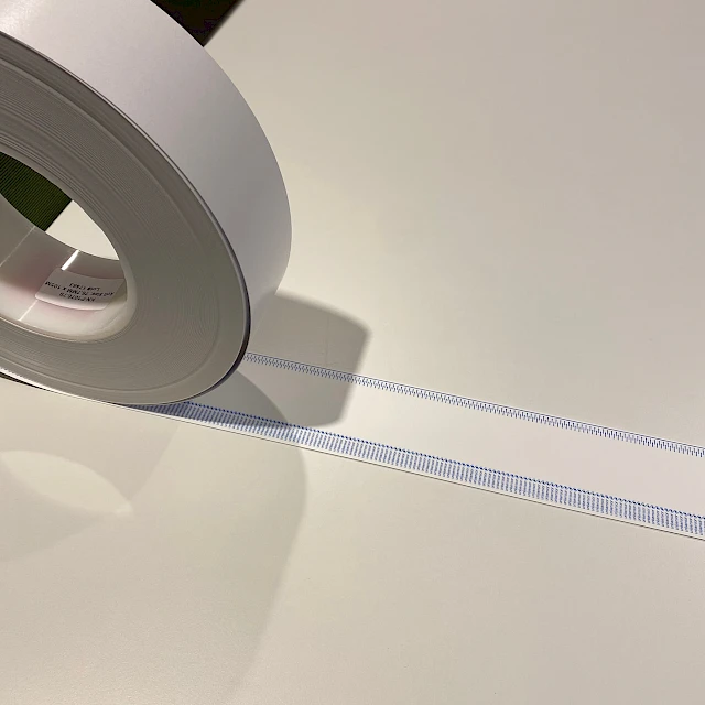 Unisensor printed tape unrolled on table