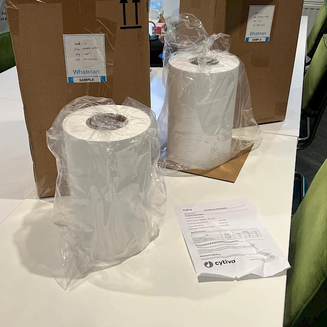Whatman rolls and boxes on meeting table