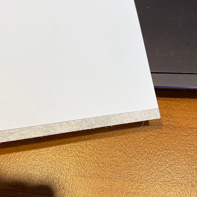 White backing card sheet on laptop