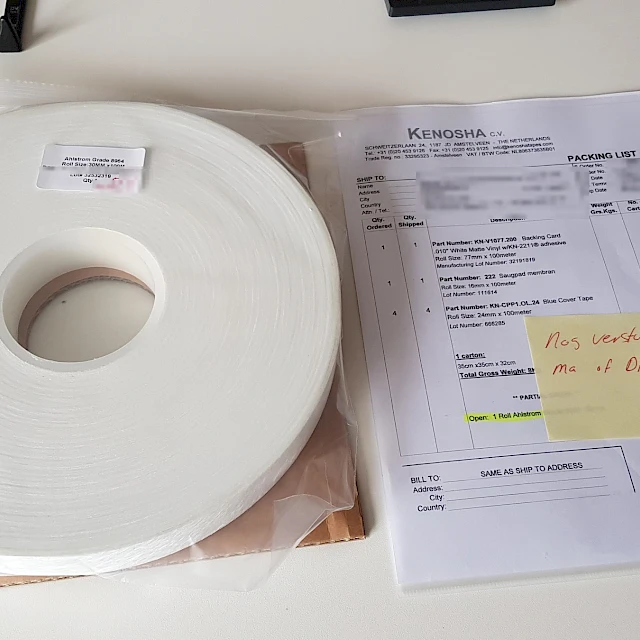 White foam tape roll with packing list