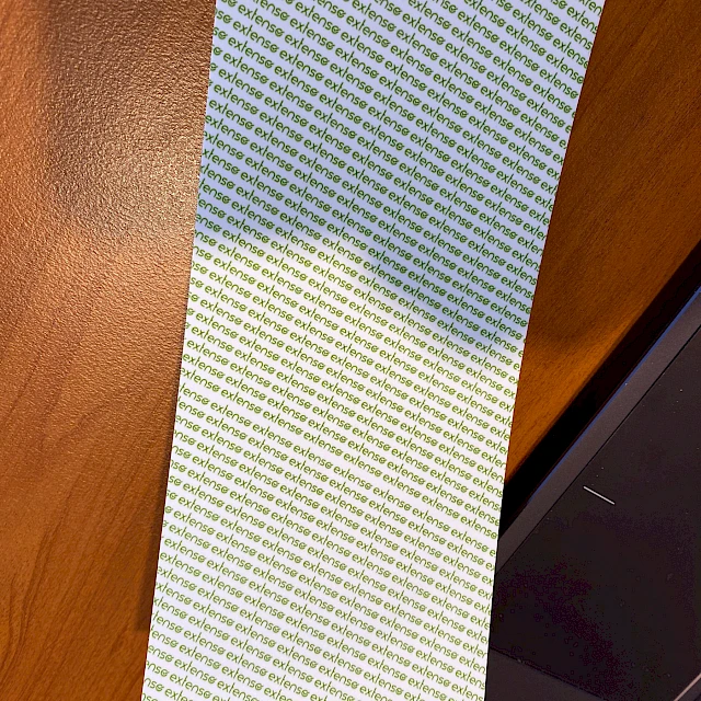 White liner with green text print