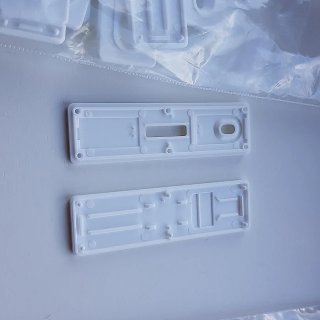 White plastic cassette parts and bags