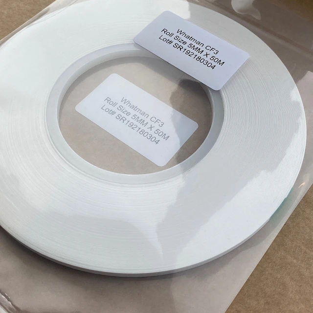 White roll in bag with label