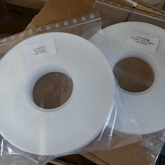 White rolls in bags on carton