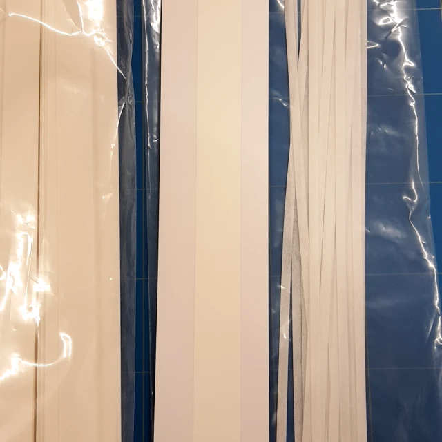 White strips in bags on cutting mat