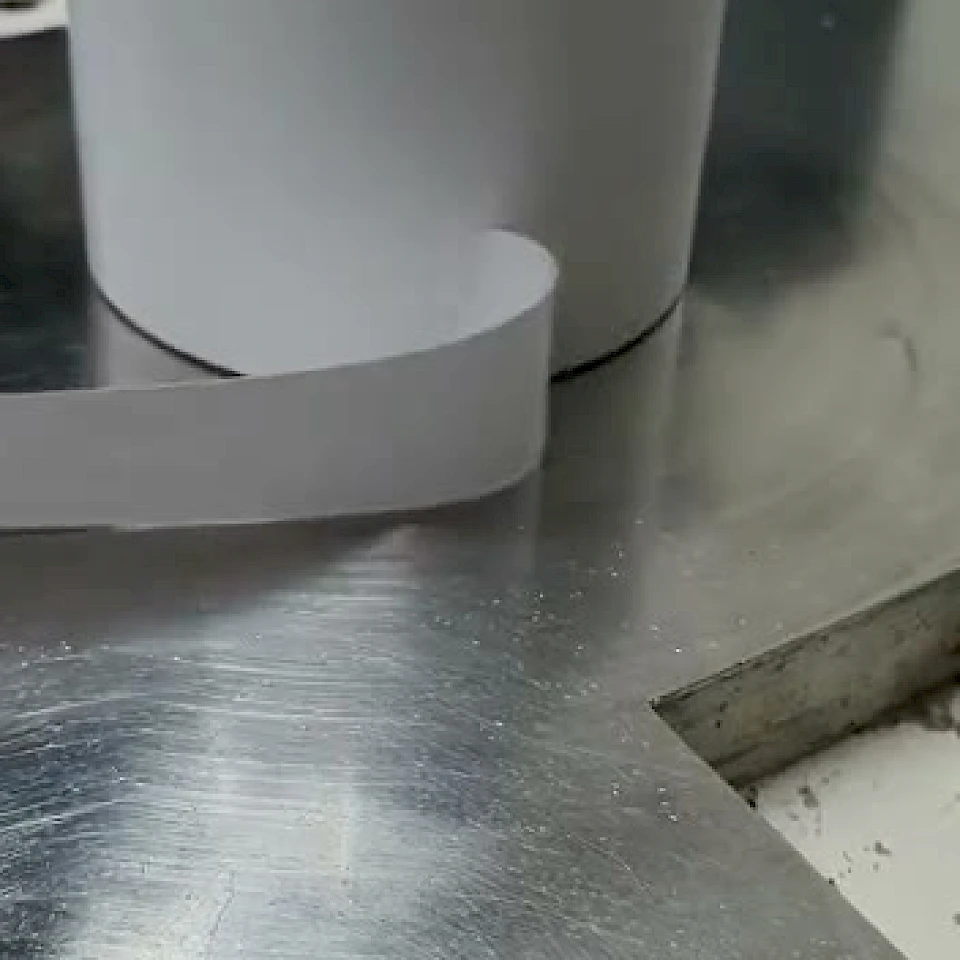 White tape roll winding on rewinder