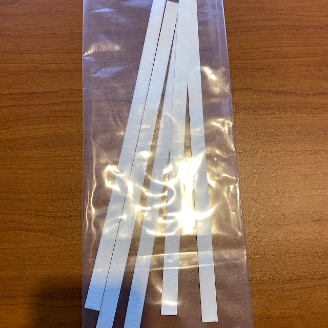 White test strips in labelled bag