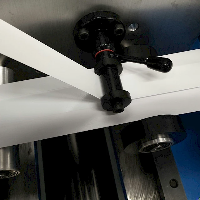 White web over rollers with clamp handle