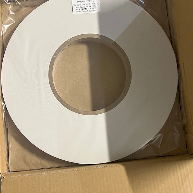Wide white roll packed in carton top view
