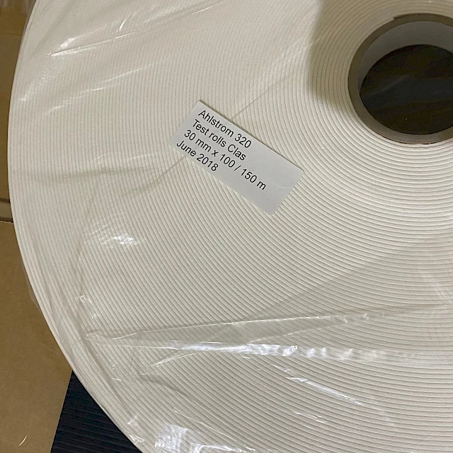 Wrapped filter roll with label