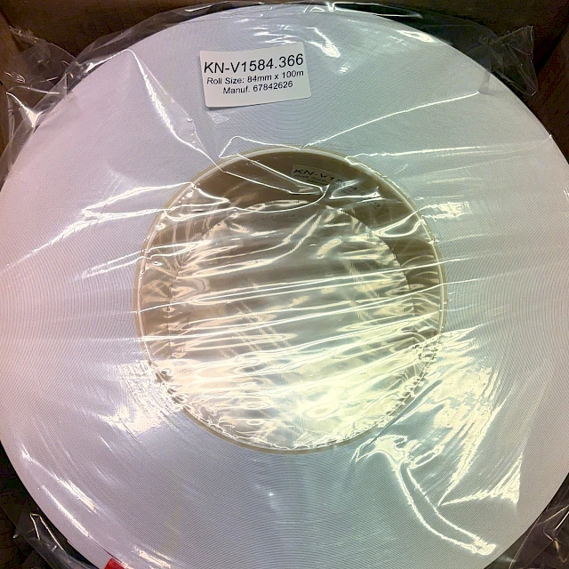 Wrapped KN v1584 roll in box