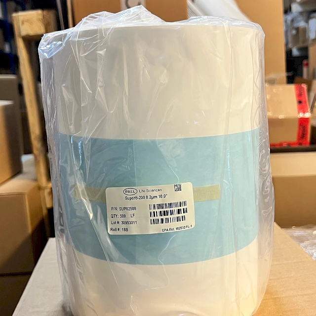 Wrapped membrane roll on carton in warehouse