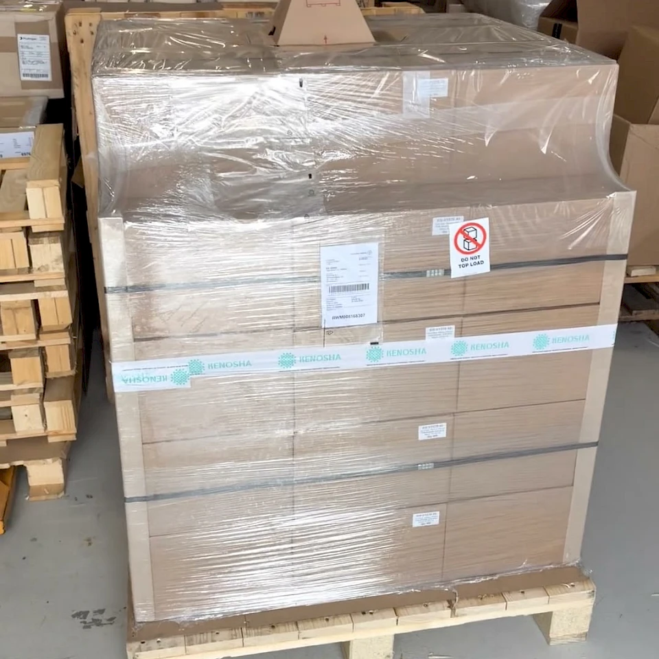 Wrapped pallet cartons in warehouse