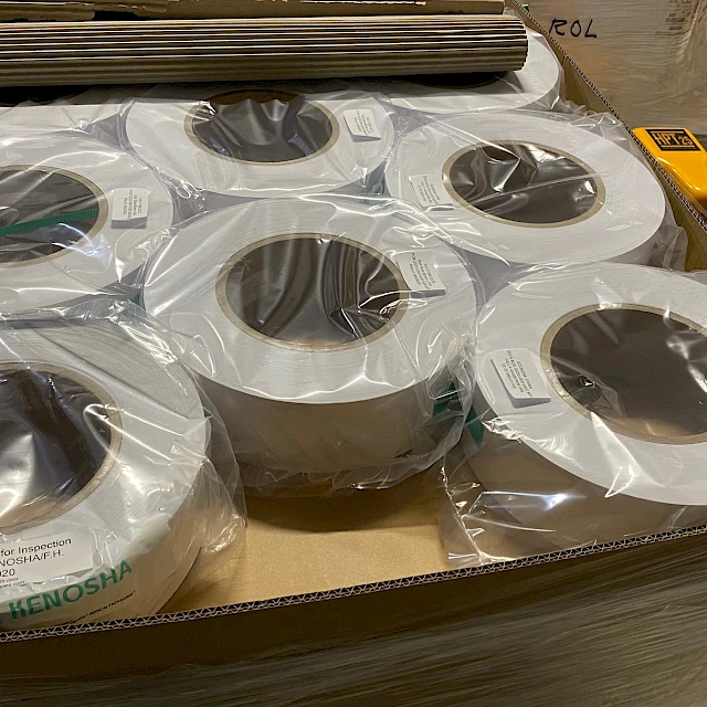 Wrapped white rolls carton on pallet