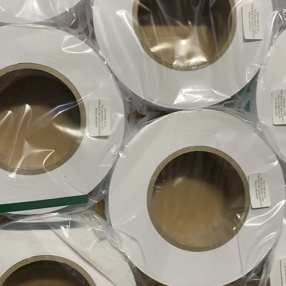Wrapped white rolls in carton