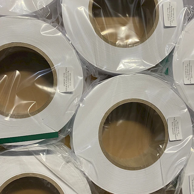 Wrapped white rolls in carton