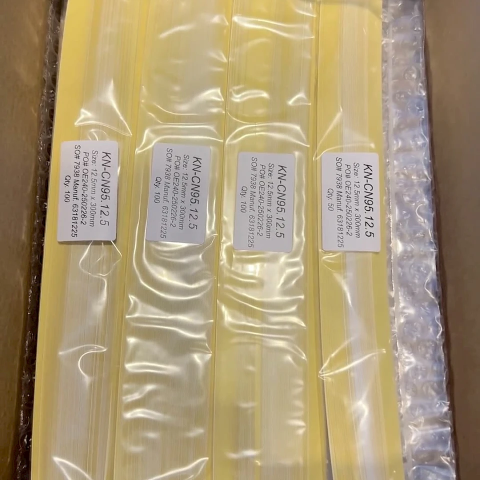 Yellow backing card packs in bubble wrap box